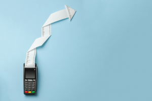 payment terminal with receipt paper folder in an arrow shape