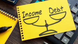 Sticky notes showing a depiction of debt service coverage ratio.